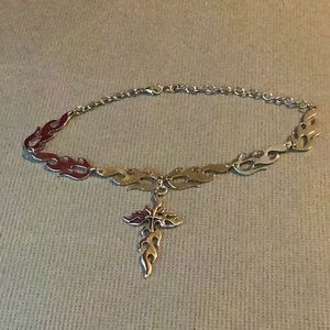 A fire cross necklace